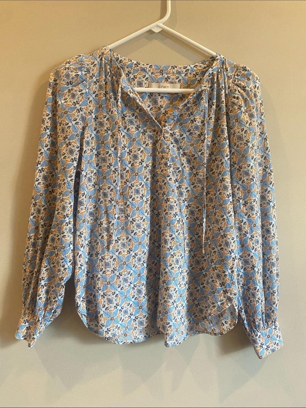 LOFT. Light Blue Patterned Women’s Peasant Blouse with tie string closure.